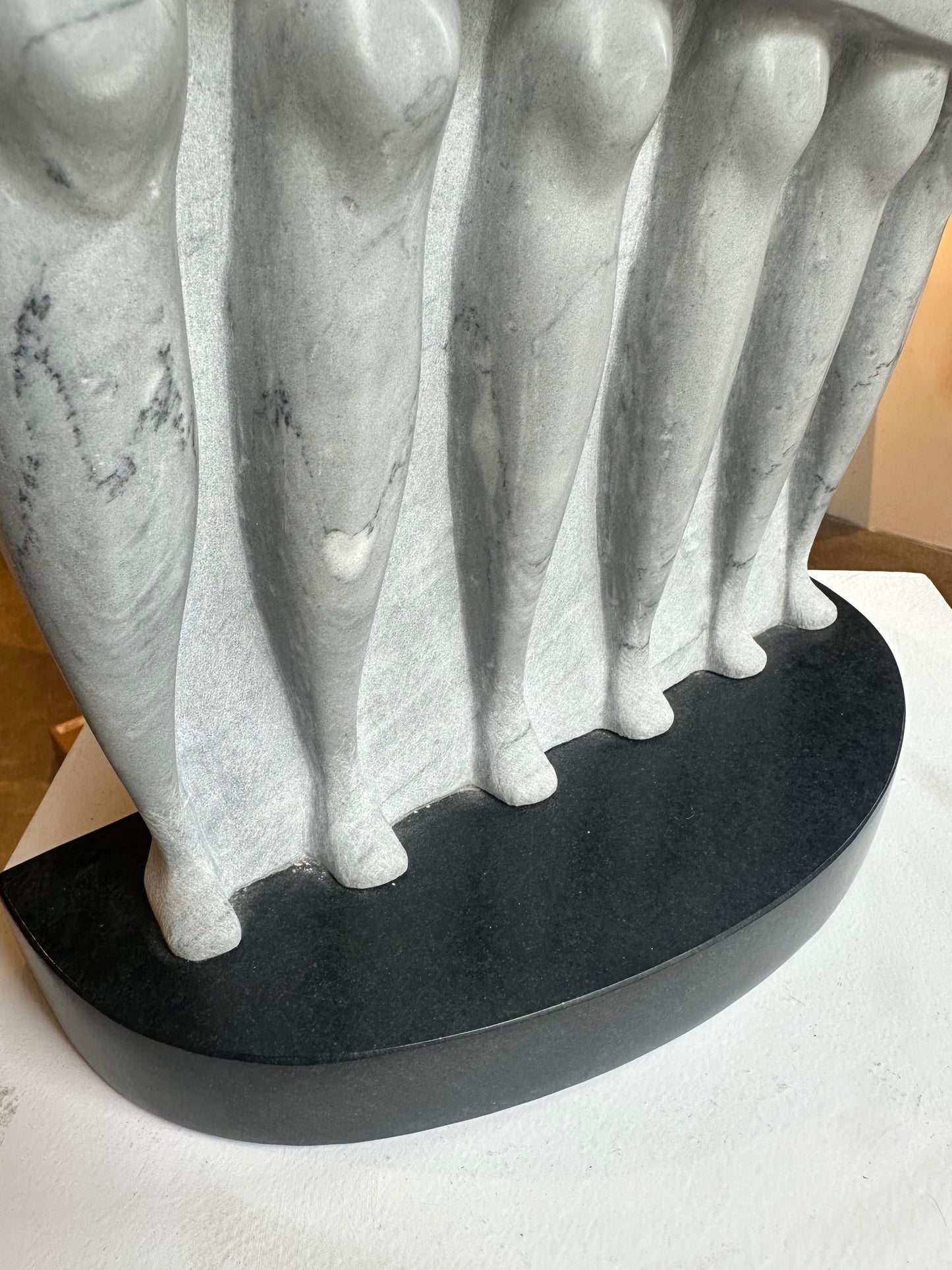 Gray marble sculpture by PNW artist Ted Shillock (b.1944)