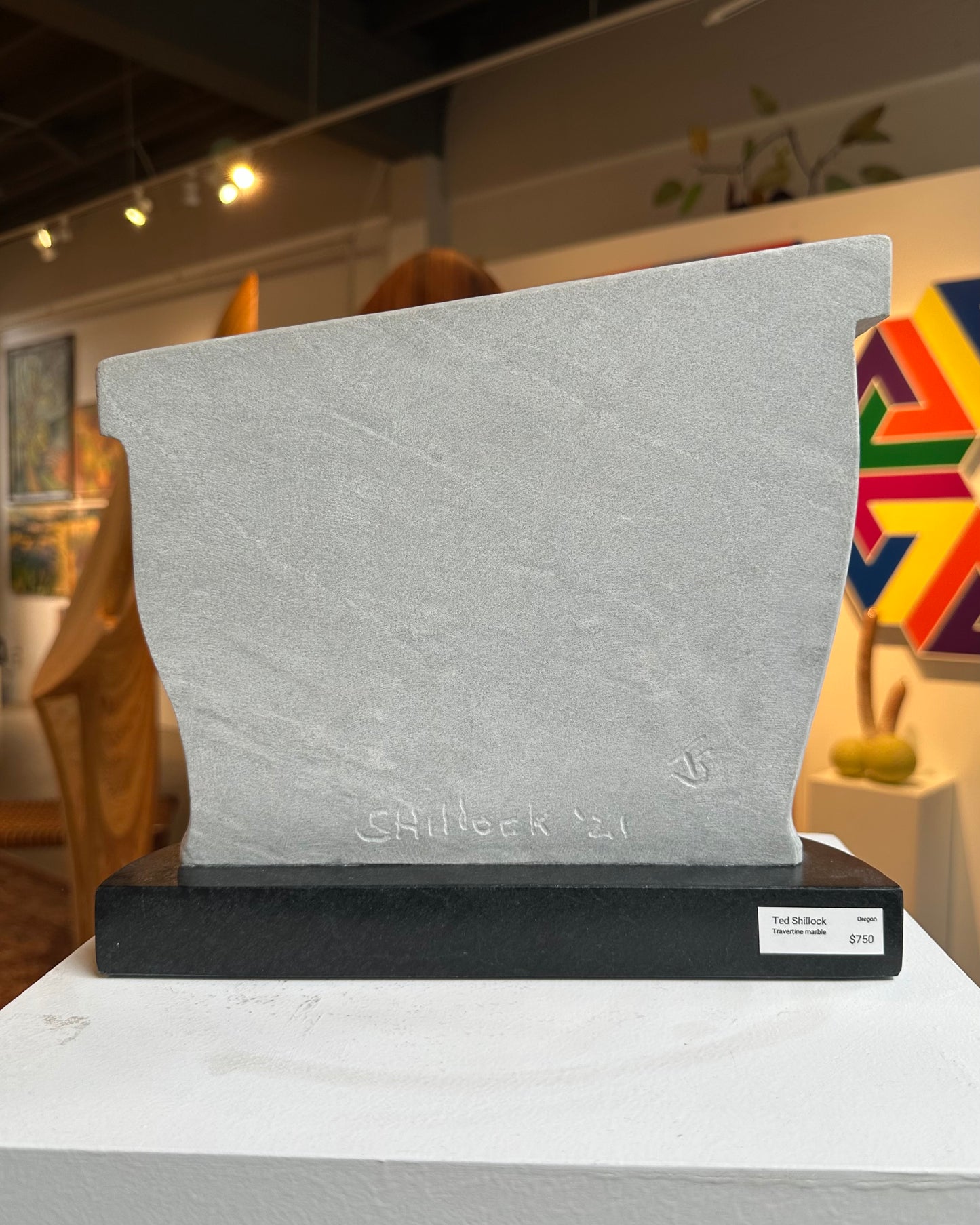 Gray marble sculpture by PNW artist Ted Shillock (b.1944)