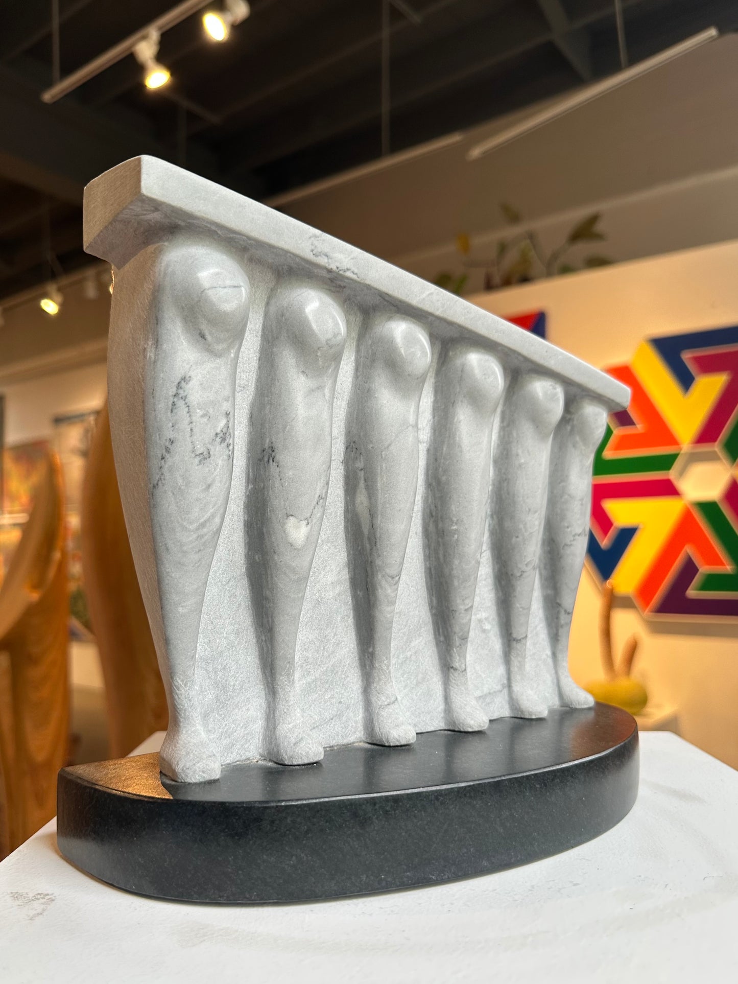 Gray marble sculpture by PNW artist Ted Shillock (b.1944)