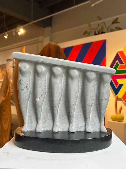 Gray marble sculpture by PNW artist Ted Shillock (b.1944)